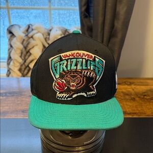 Mitchell & Ness Black Snapback Hat with Teal Undervisor